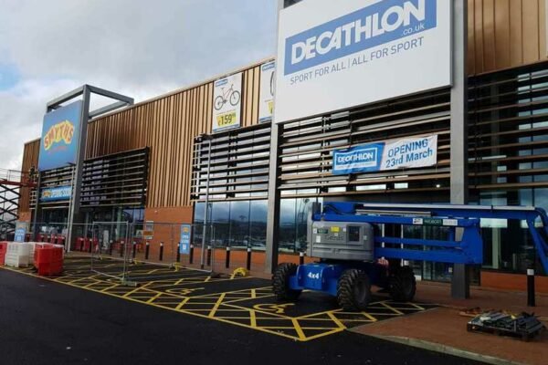 Decathalon and Smyths exterior with a crane
