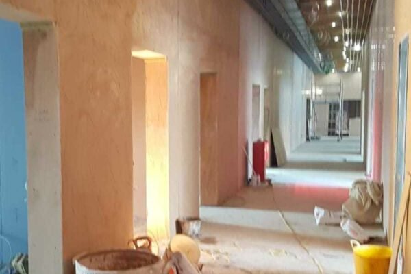 Stripped out hallway building site