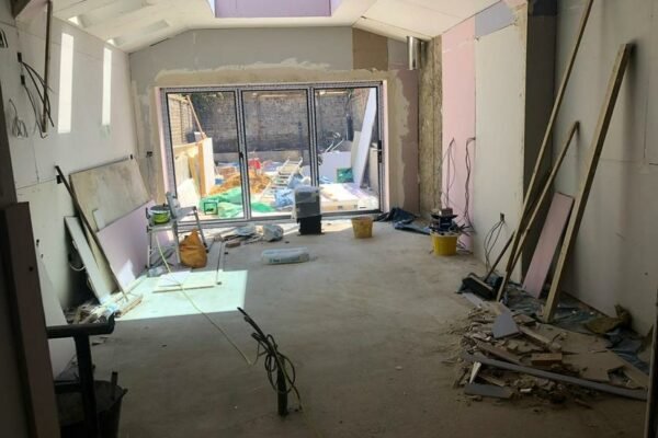Interior building site with double doors leading to outside fitted