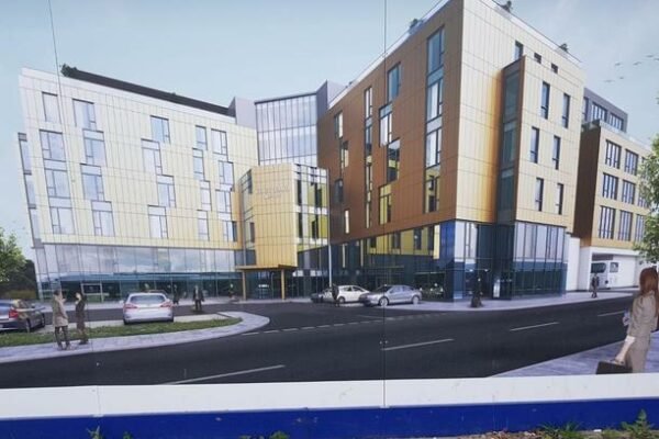 3D render of large modern building with a billboard