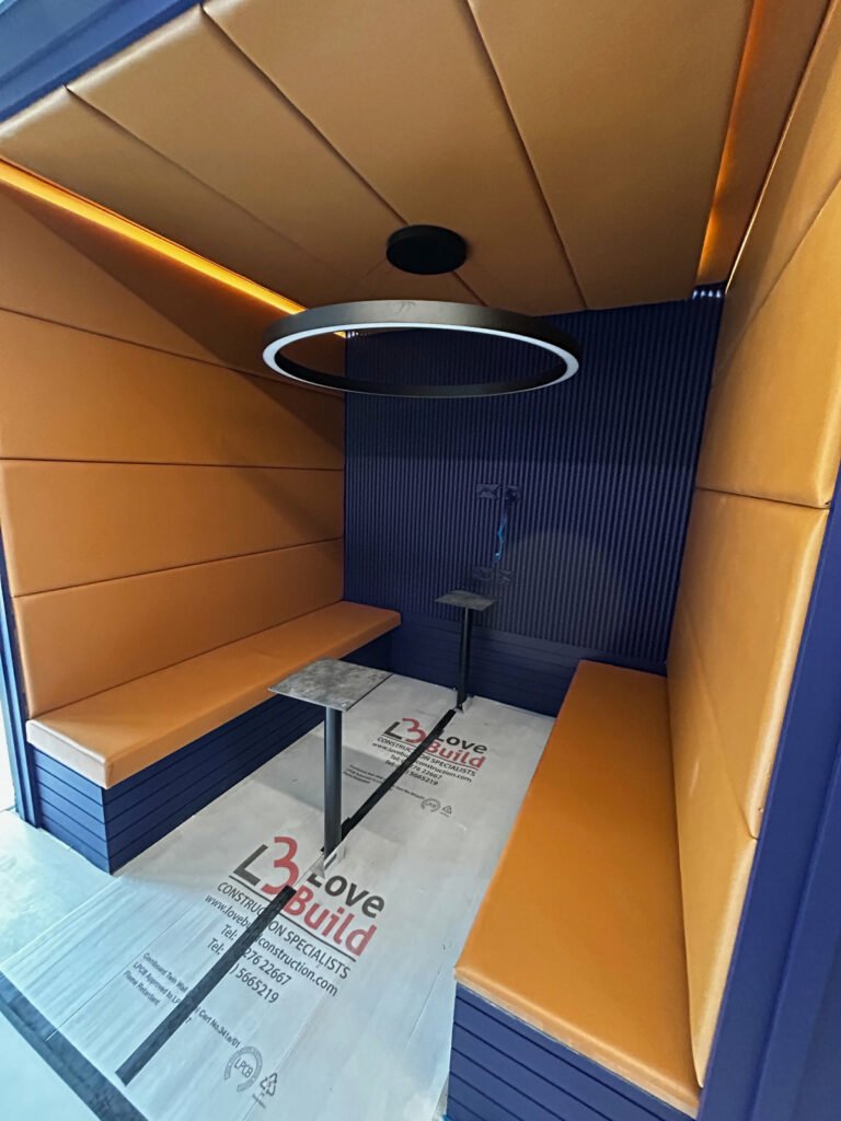Interior of a modern room with booth table
